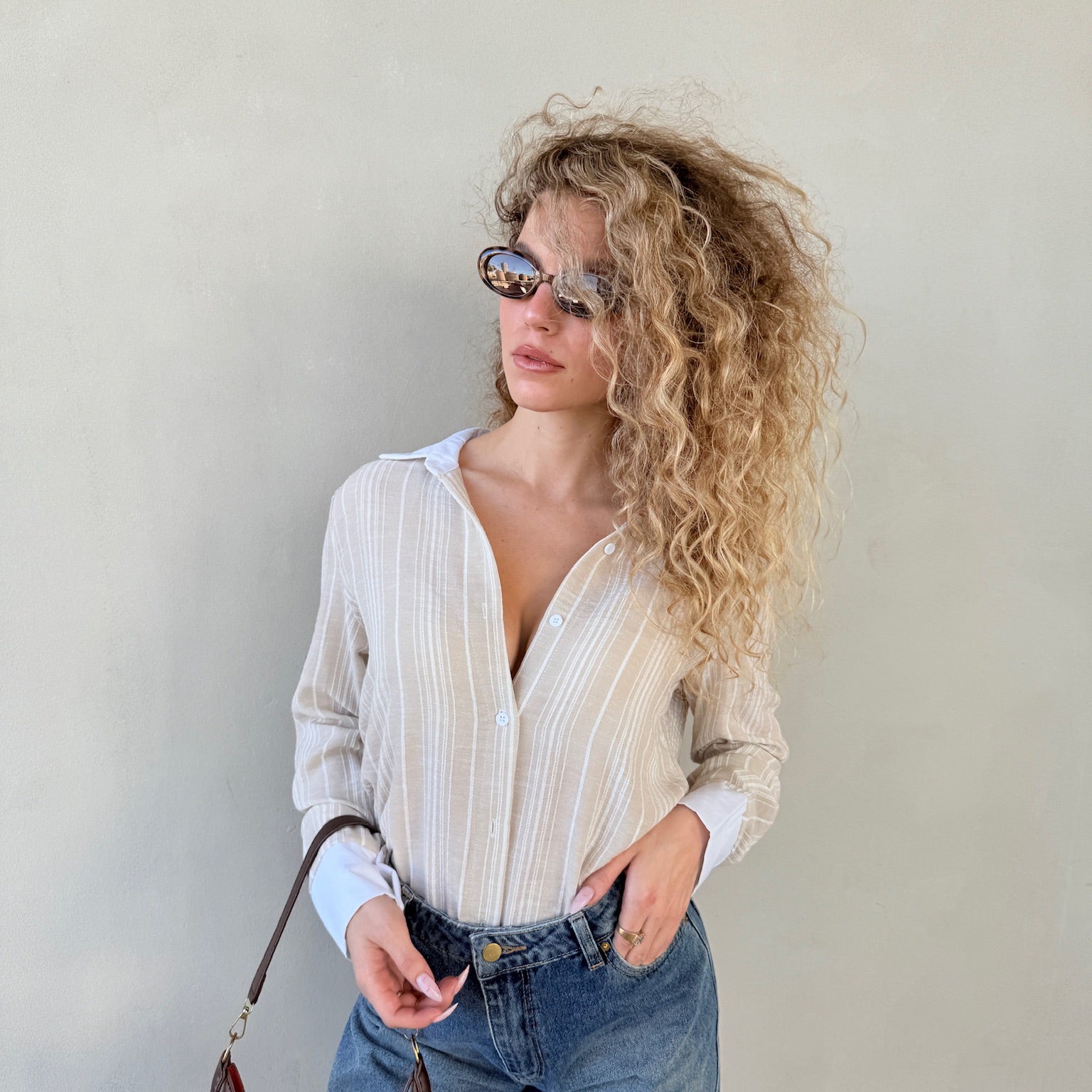 מכופתרת | מיליה פסים